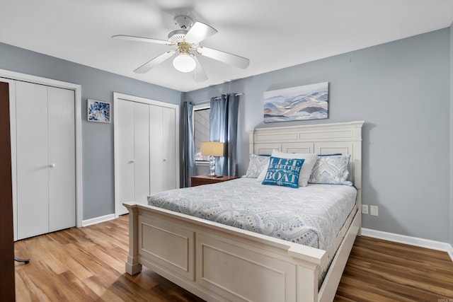 350 Peters Pt Unit L1, Hot Springs, AR 71913 - bedroom featuring ceiling fan, baseboards, multiple closets, and wood finished floors