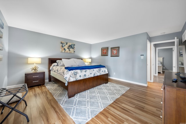 350 Peters Pt Unit L1, Hot Springs, AR 71913 - bedroom with baseboards and wood finished floors
