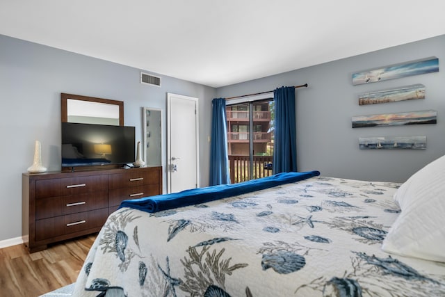 350 Peters Pt Unit L1, Hot Springs, AR 71913 - bedroom featuring access to outside, baseboards, visible vents, and light wood-style floors