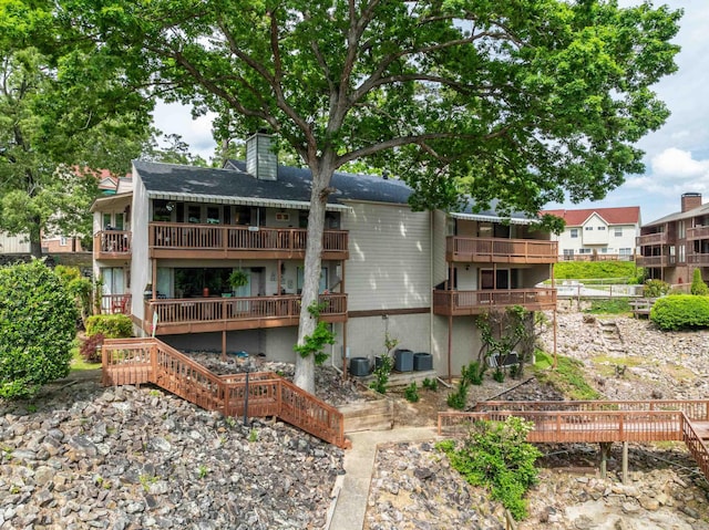 350 Peters Pt Unit L1, Hot Springs, AR 71913 - back of house with a chimney