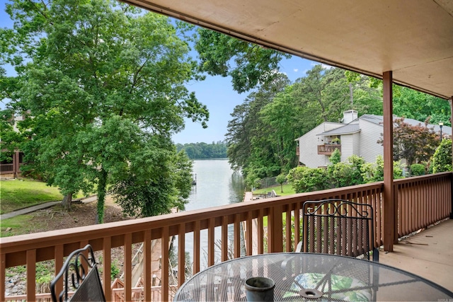 350 Peters Pt Unit L1, Hot Springs, AR 71913 - wooden terrace featuring a water view and outdoor dining space