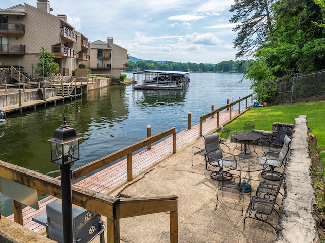 350 Peters Pt Unit L1, Hot Springs, AR 71913 - view of dock featuring a water view and a yard