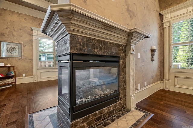 room details featuring wood finished floors and a fireplace