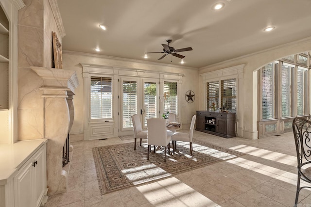 dining space featuring crown molding, recessed lighting, ceiling fan, and french doors