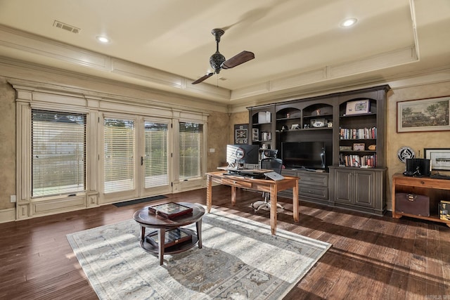 office space featuring crown molding, ceiling fan, visible vents, and dark wood-type flooring