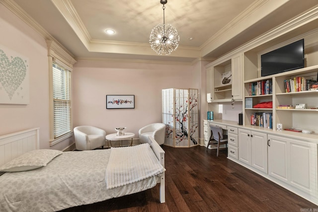 bedroom with crown molding, radiator heating unit, built in study area, and dark wood-type flooring