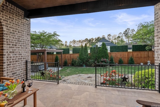 view of patio with a fenced backyard