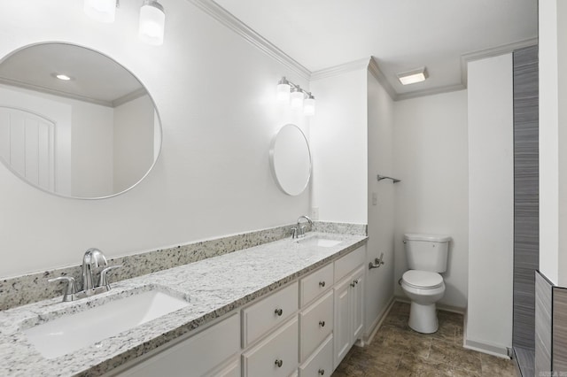 full bathroom featuring double vanity, a sink, toilet, and ornamental molding
