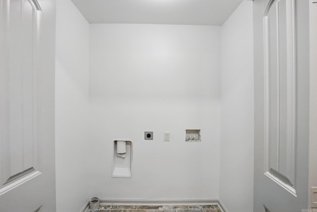 laundry area featuring baseboards, electric dryer hookup, washer hookup, and laundry area