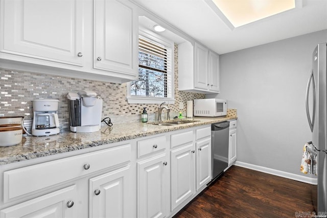120 Catalina Cir Unit 2A, Hot Springs, AR 71913 - kitchen featuring baseboards, white cabinetry, tasteful backsplash, dark wood finished floors, and stainless steel appliances