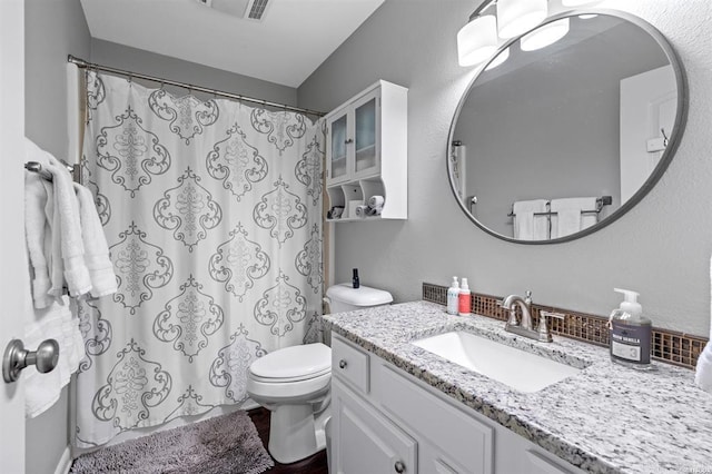 120 Catalina Cir Unit 2A, Hot Springs, AR 71913 - full bathroom with vanity, toilet, and a shower with shower curtain
