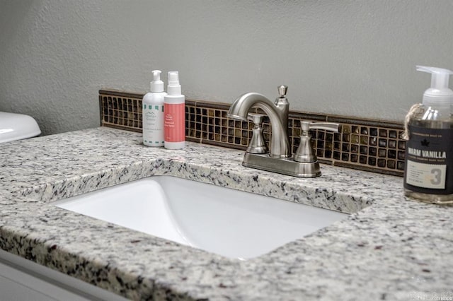 120 Catalina Cir Unit 2A, Hot Springs, AR 71913 - details featuring a sink, tasteful backsplash, and a textured wall