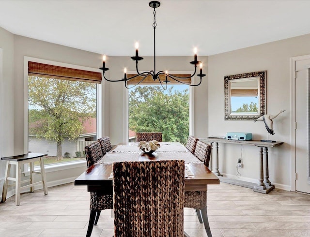 101 Long Island Dr Unit 1004, Hot Springs, AR 71913 - dining room featuring an inviting chandelier, baseboards, and plenty of natural light