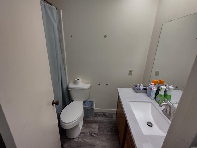 full bathroom featuring toilet and vanity