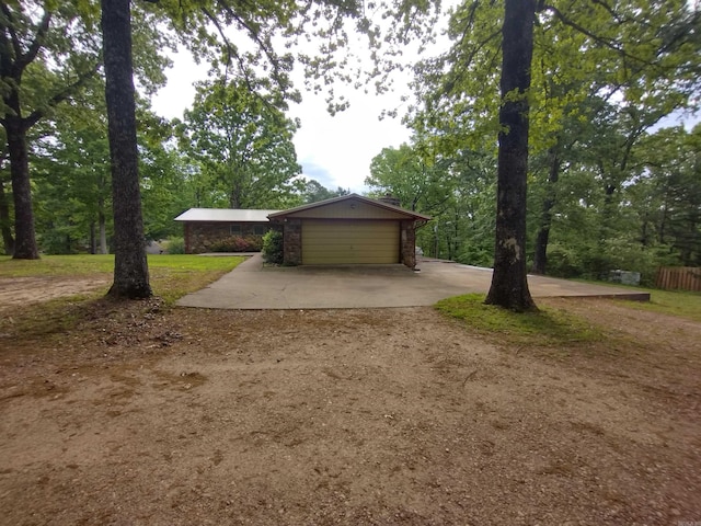 garage featuring driveway