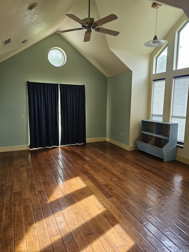 161 Funderburg Rd, Mineral Sprs, AR 71851 - unfurnished living room featuring a ceiling fan, visible vents, vaulted ceiling, and hardwood / wood-style floors