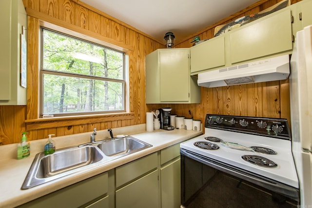 143 Hurricane Dr, Greers Ferry, AR 72067 - kitchen featuring a sink, wooden walls, light countertops, under cabinet range hood, and electric stove
