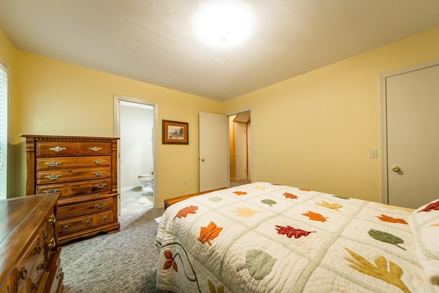 143 Hurricane Dr, Greers Ferry, AR 72067 - carpeted bedroom featuring ensuite bathroom