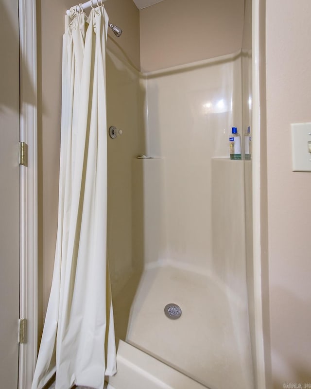 143 Hurricane Dr, Greers Ferry, AR 72067 - full bathroom with a shower stall