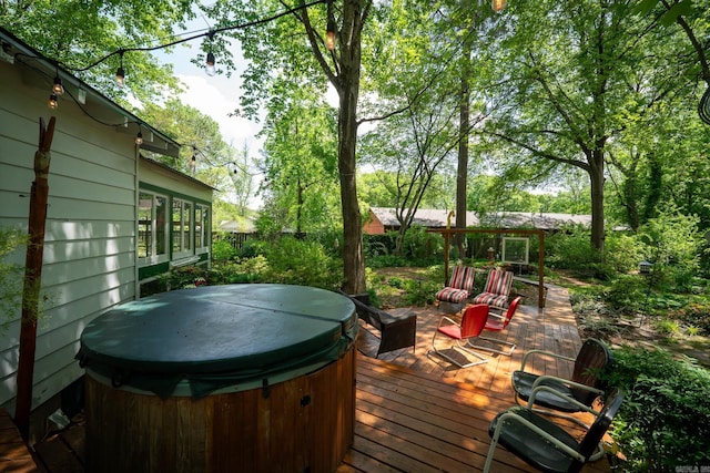 deck with a hot tub