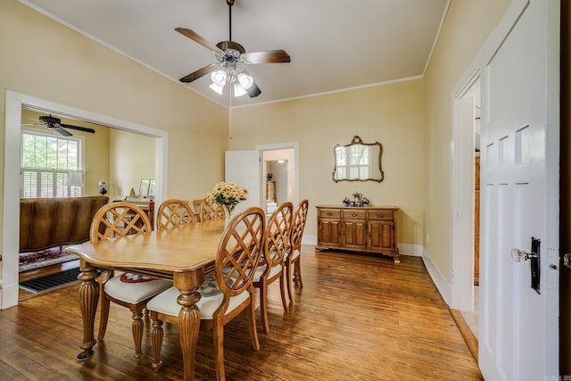 dining area featuring ornamental molding, ceiling fan, and wood finished floors