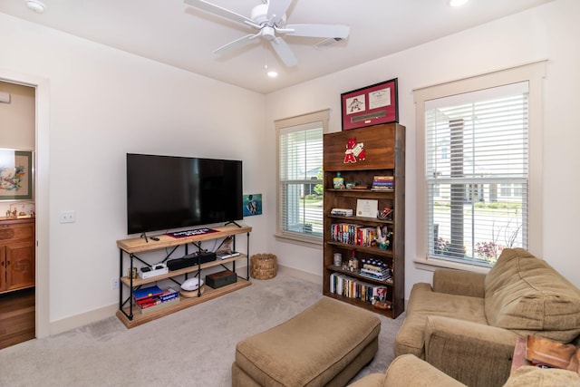 living area with baseboards, carpet flooring, ceiling fan, and recessed lighting