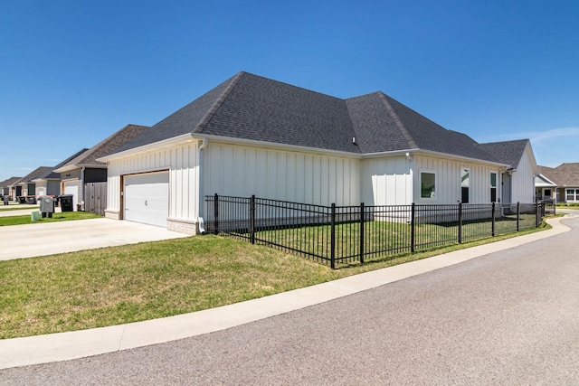 view of home's exterior featuring a garage, fence, board and batten siding, concrete driveway, and a lawn