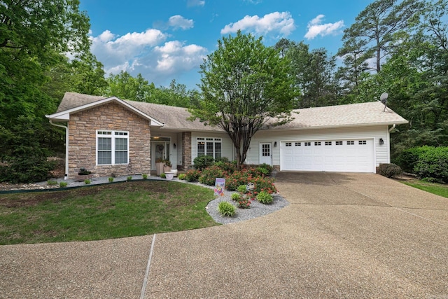 ranch-style house with a shingled roof, stone siding, a garage, a front yard, and concrete driveway