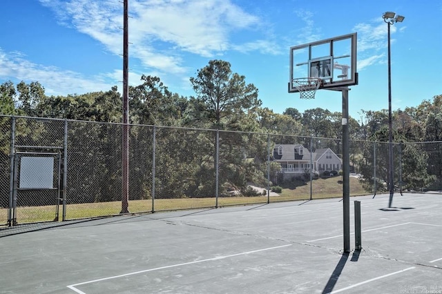 view of sport court with fence and community basketball court