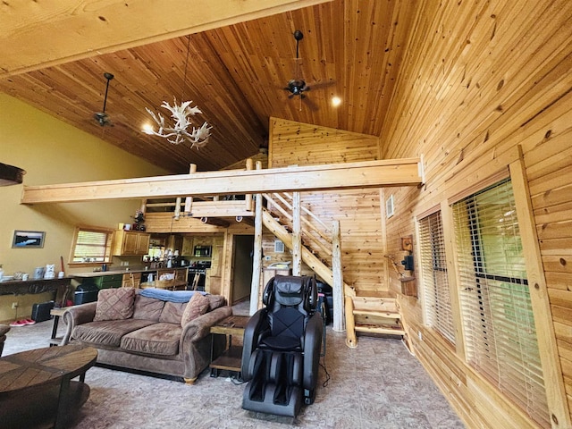 living area with high vaulted ceiling and wooden ceiling