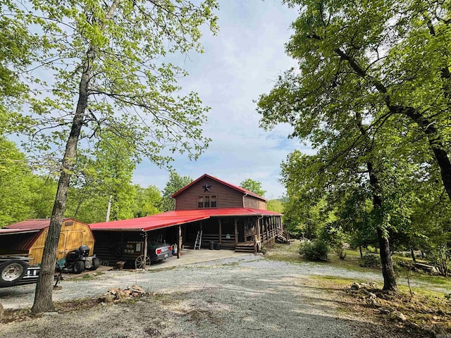 view of front of home featuring metal roof