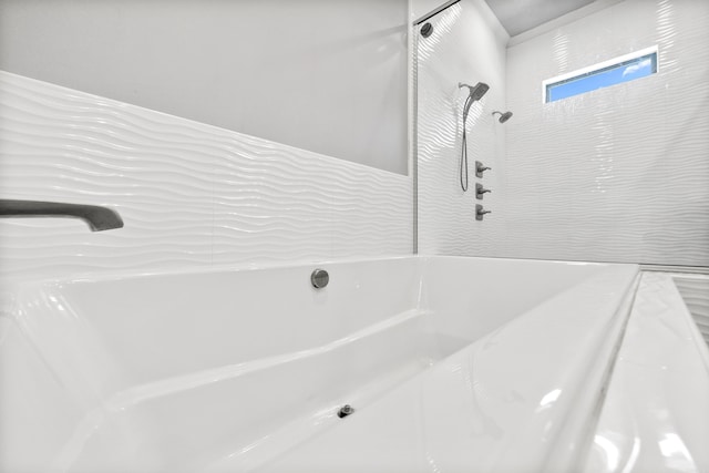 bathroom featuring a tub