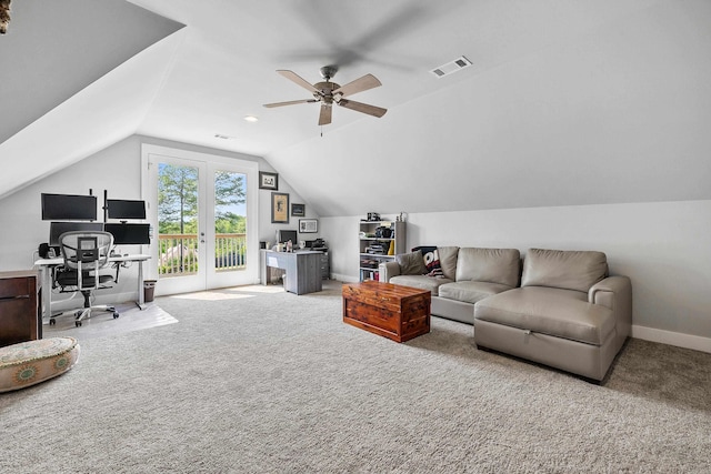 living room with ceiling fan, carpet floors, baseboards, lofted ceiling, and visible vents