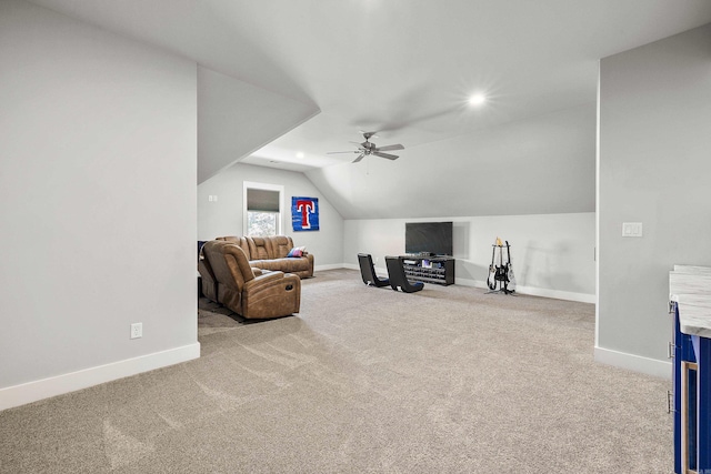 interior space featuring recessed lighting, ceiling fan, baseboards, and lofted ceiling