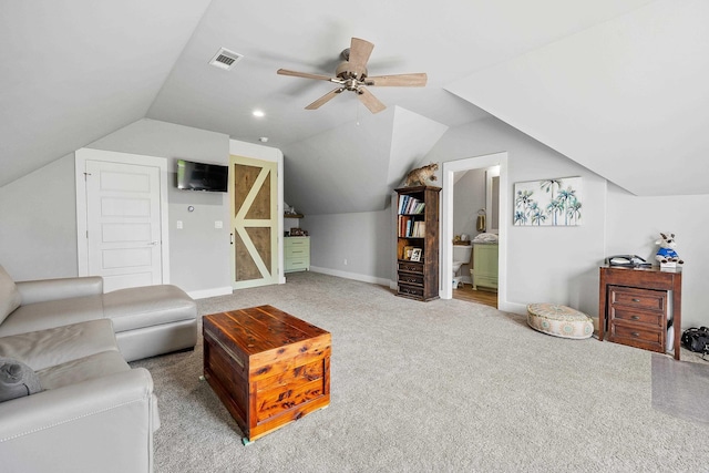 living room featuring carpet, a ceiling fan, baseboards, lofted ceiling, and visible vents