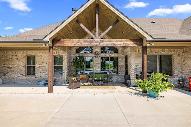 exterior space featuring an outdoor living space and grilling area
