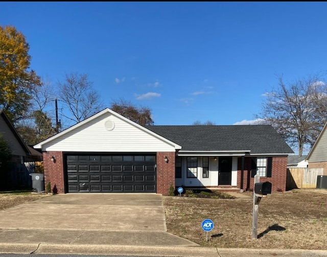 104 Louis, Searcy, AR 72143 - single story home featuring a garage, driveway, and brick siding