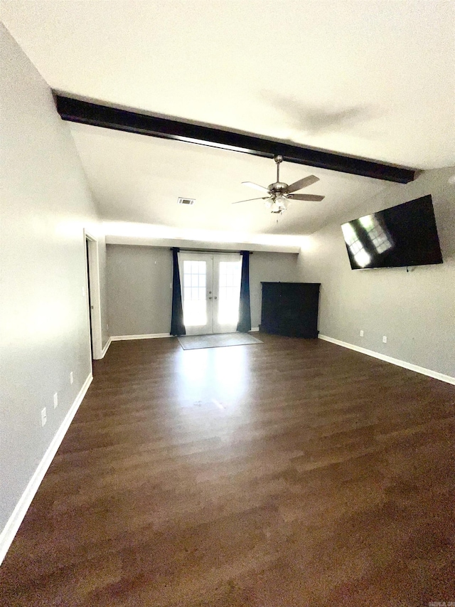 104 Louis, Searcy, AR 72143 - unfurnished living room with baseboards, french doors, and beamed ceiling
