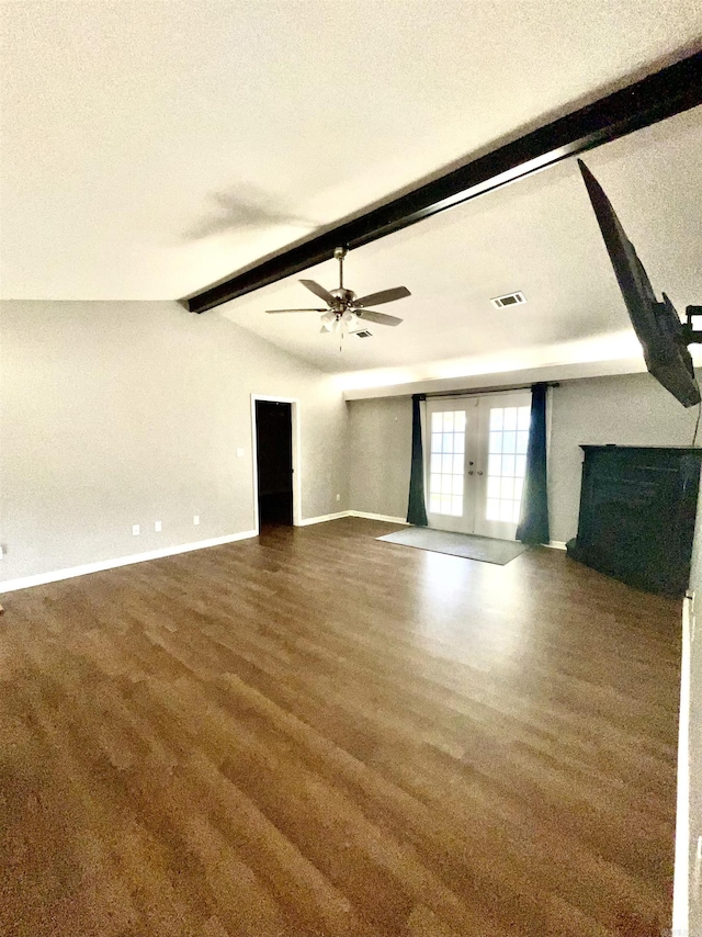104 Louis, Searcy, AR 72143 - unfurnished living room featuring french doors, visible vents, wood finished floors, baseboards, and lofted ceiling with beams