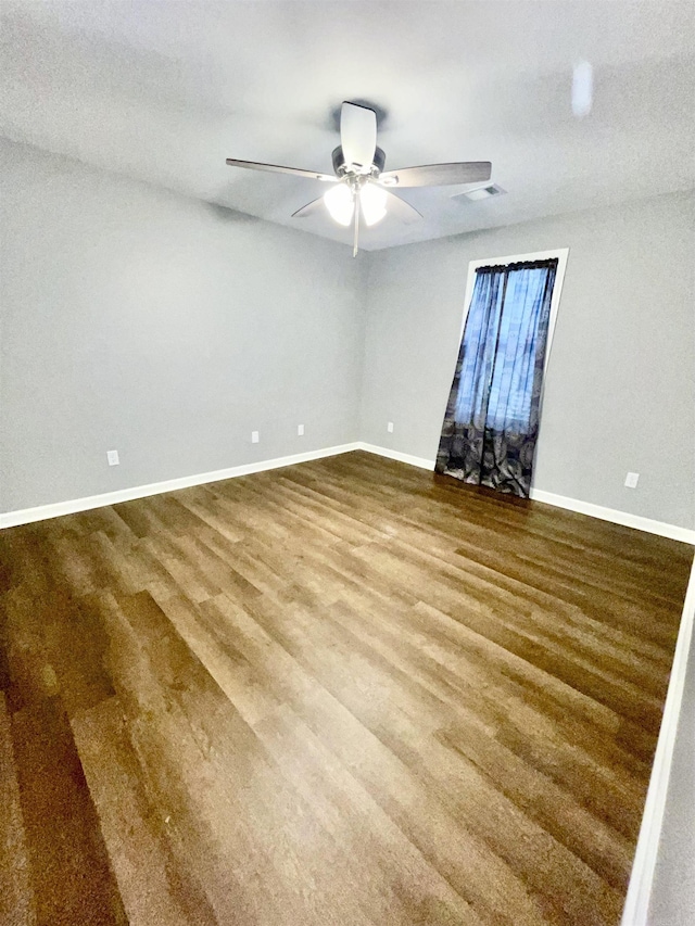 104 Louis, Searcy, AR 72143 - empty room featuring baseboards, a ceiling fan, wood finished floors, and visible vents