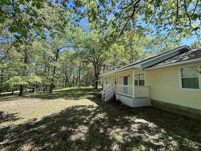 view of yard with a porch