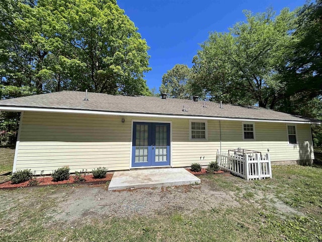 back of house featuring french doors