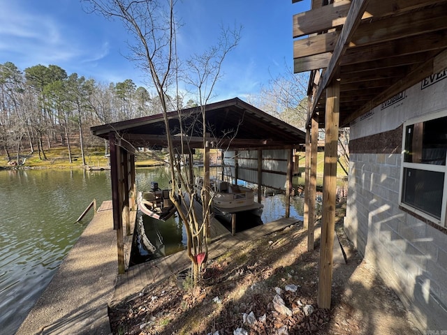 exterior space featuring a water view and boat lift