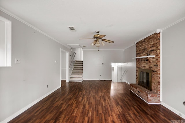 unfurnished living room featuring crown molding, a ceiling fan, baseboards, and wood finished floors