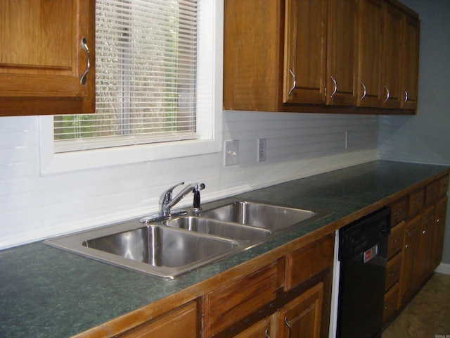 1526 Pine Manor Dr, Arkadelphia, AR 71923 - kitchen with black dishwasher, dark countertops, and a sink
