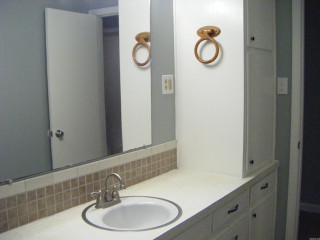 1526 Pine Manor Dr, Arkadelphia, AR 71923 - bathroom featuring vanity and tasteful backsplash