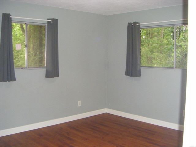 1526 Pine Manor Dr, Arkadelphia, AR 71923 - empty room with baseboards and wood finished floors