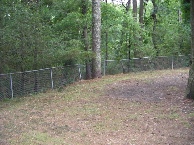1526 Pine Manor Dr, Arkadelphia, AR 71923 - view of yard with a view of trees and fence