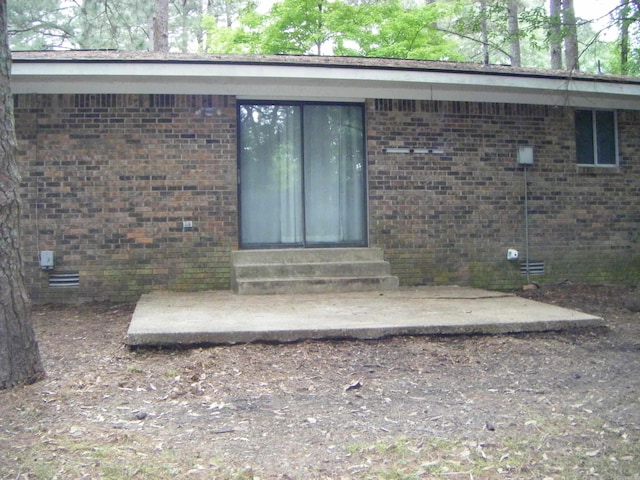 1526 Pine Manor Dr, Arkadelphia, AR 71923 - doorway to property featuring brick siding and crawl space