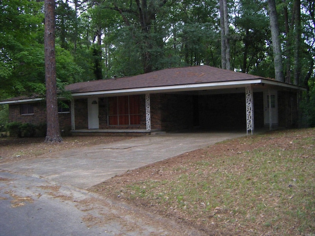 1526 Pine Manor Dr, Arkadelphia, AR 71923 - view of front facade with concrete driveway and covered porch